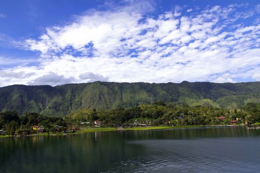 View from Tuk-Tuk Village to Samosir Island. Lake Toba, North Sumatra, Indonesia.