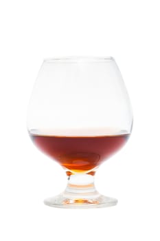 nice glass of cognac on a white background