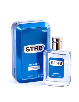 BUCHAREST, ROMANIA - FEB 17,2014: A case of STR8 case aftershace lotion isolated on white. Aftershave is a Lotion, Gel, Balm, or liquid used mainly by men after they have finished shaving.
