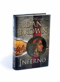 BUCHAREST, ROMANIA - FEB 17,2014: Inferno written by Dan Brown isolated on white.Inferno is a 2013 mystery thriller novel by Dan Brown and the fourth book in his Robert Langdon series, following Angels & Demons, The Da Vinci Code and The Lost Symbol