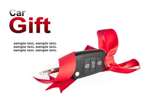 Gift key concept with red Bow on a white background.