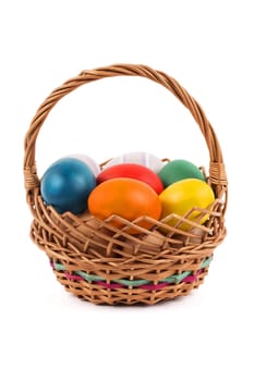 Easter eggs in a basket, on a white background