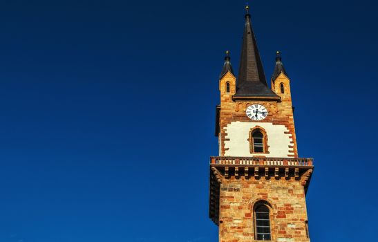 City clock tower, in Bistrita, Romania.