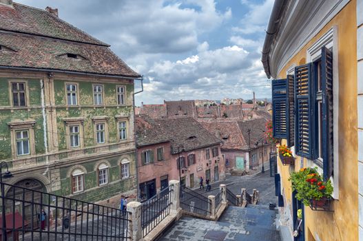 SIBIU, ROMANIA - JULY 16: The Small Square On July 16, 2013 In Sibiu, Romania. The buildings here date since the 14-16th centuries and used to house crafts workshops and town guilds.