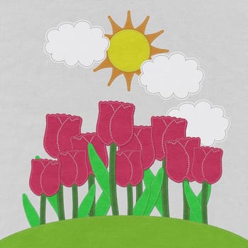 Tulip on green grass field with stitch style fabric background