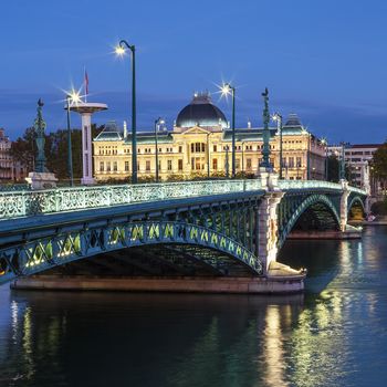 View of famous bridge and University in Lyon by night