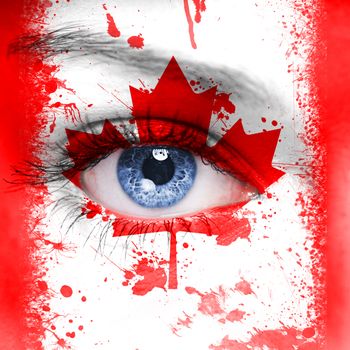 Canada flag painted on woman face