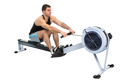 man exercising on rowing machine,  hands slightly blurred in motion
