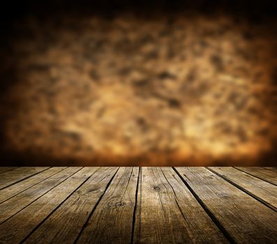 Wooden deck table and dark brown background