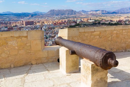 Alicante skyline and old canyons of Santa Barbara Castle in Spain