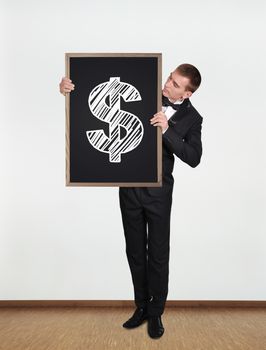 businessman holding blackboard with drawing dollar symbol