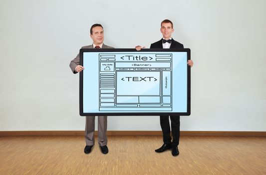 two businessman in room holding plasma panel with template  website