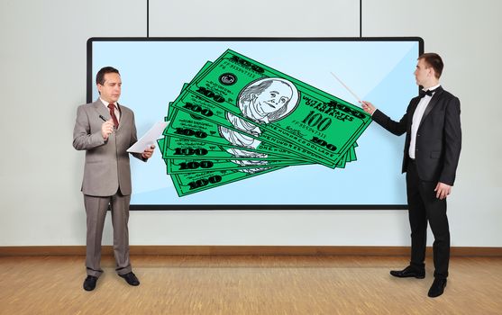 two businessman in office and dollars  on plasma panel