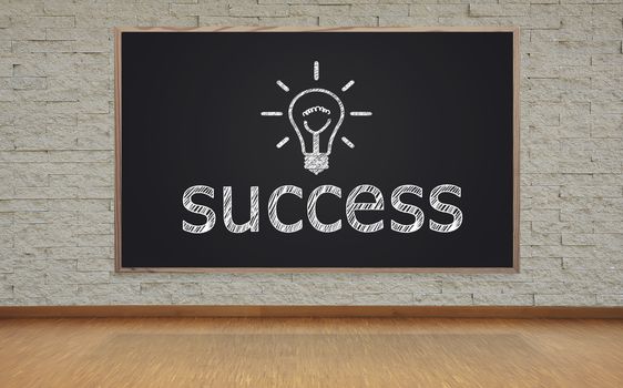 blackboard with success concept on brick wall in office