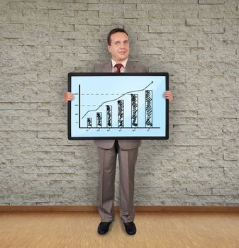 businessman in room holding plasma with graphic