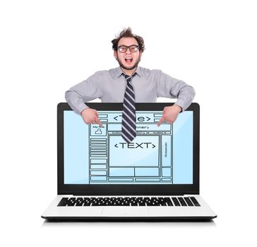 happy businessman pointing to laptop with template website