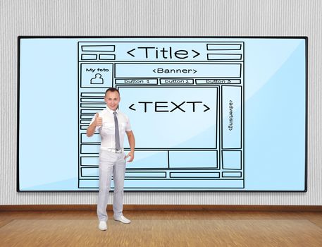 businessman showing thumb up and screen with website scheme