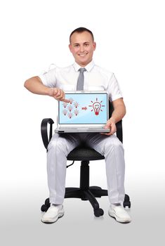 businessman sitting on chair and holding laptop with lamps