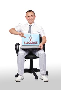 businessman sitting in chair and holding laptop with success