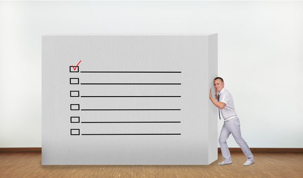 businessman pushing concrete wall with check box