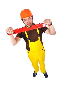 builder looking at wasserwaage on a white background