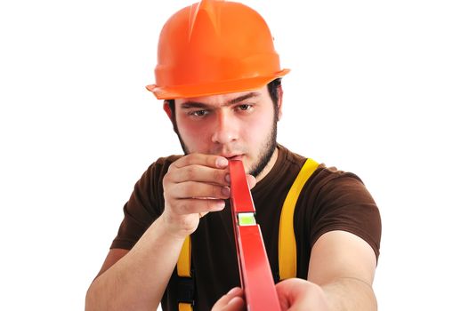 builder holding wasserwaage on a white background