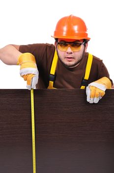 builder with yellow tape measure on a white background