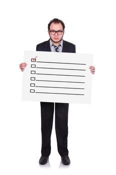 businessman holding a placard with checklist