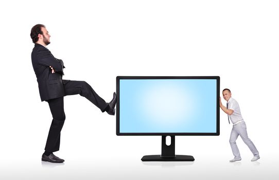 two businessman pushing big monitor isolated on white
