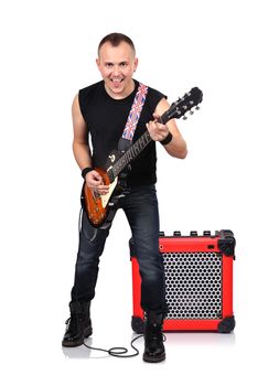 rock musician is playing electrical guitar and guitar combo