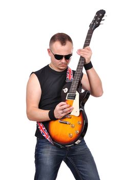 rock musician is playing electrical guitar, close up