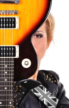 rock star girl looking on  electric guitar
