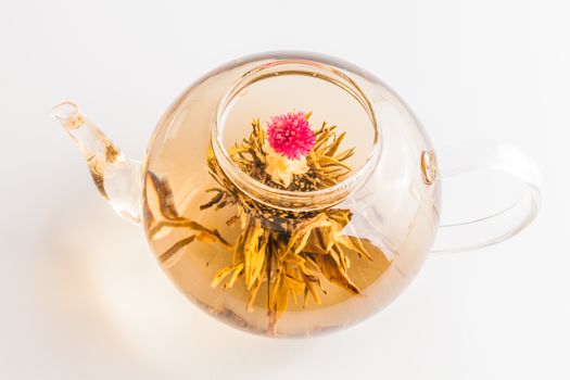 Studio shot of Tea Flower in a Clear Teapot