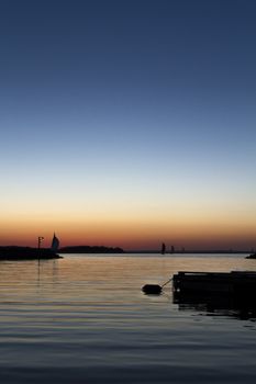 Harbour at sunset boats coming in