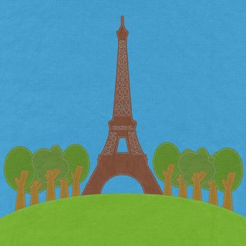 Eiffel tower, Paris. France in stitch style on fabric background