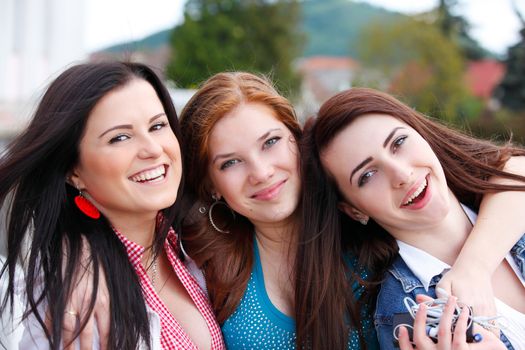 Portrait happy young and attractive girlfriends 