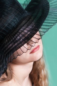 Young woman in a hat portrait