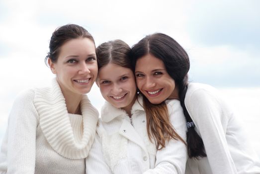 Three young woman enjoying autumn 