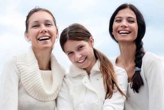 Three young woman enjoying autumn