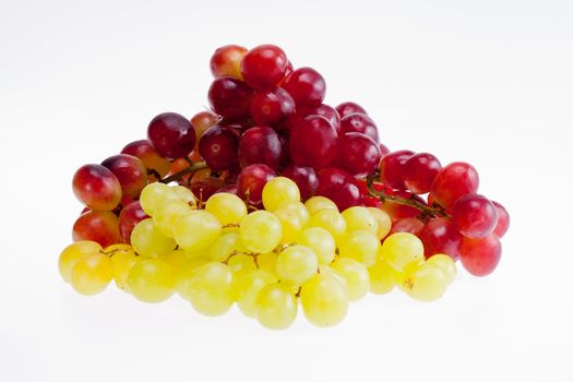 bunches  of red and green grapes isolated on white background