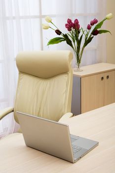 laptop on a table of director at modern office