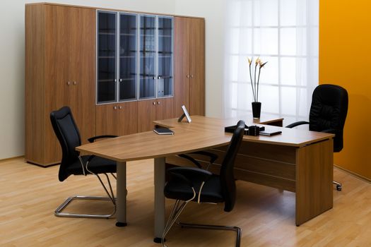 table and leather chairs in a modern office