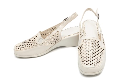 Fashionable female shoes on a white background