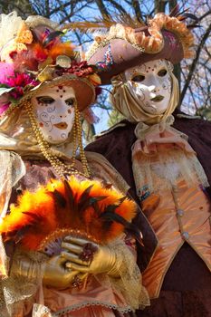 Beautiful colorful couple at the 2014 venetian carnival of Annecy, France