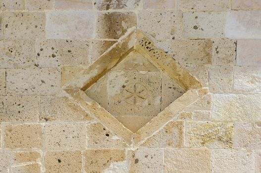 Decoration Romanesque church. Lozenge and cross six punnte