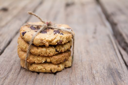 fresh xmas cookies of chocolate on wood background