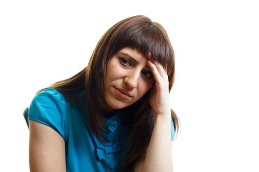 upset and tired girl on a chair on a white background