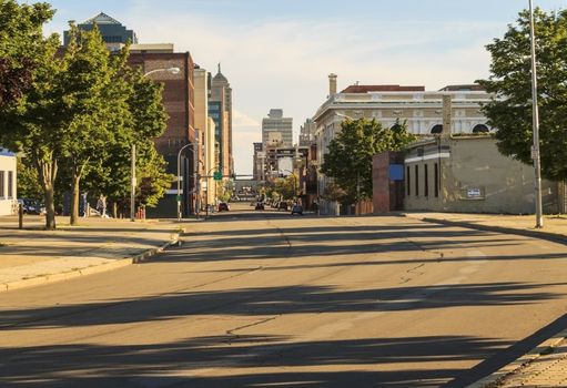 Shade decorates the street toward downtown.