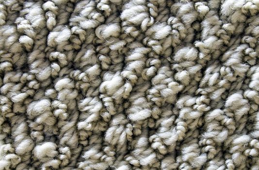 Sand colored carpet fibers. Great detail. 