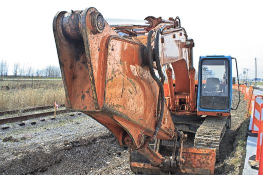 View down the arm of a backhoe. 